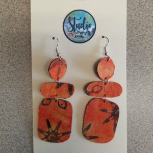 Orange Starburst statement earrings
