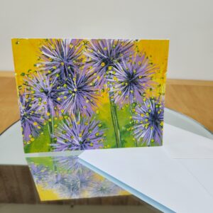 Yellow & purple note card featuring pom like flowers